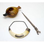 Antique horn quaich, letter opener, and whiskey decanter label.