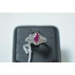 A contemporary 14ct white gold, ruby and diamond cocktail ring