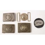 Three WWII and later German belt buckles