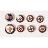 A collection of WWII enamel lapel badges