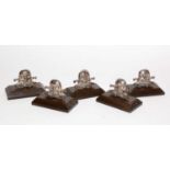 A set of five George V Royal Lancers silver menu stands,