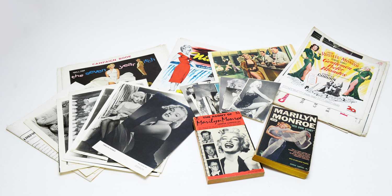 Selection of photographs, books, and ephemera relating to Marilyn Monroe