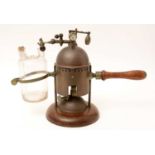 An early 20th Century vaporizer,