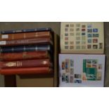 Stamps in stock books,