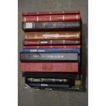 Stock books containing World stamps,