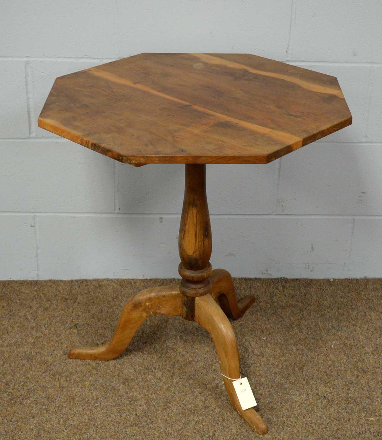 A 20th Century yew wood tripod table.