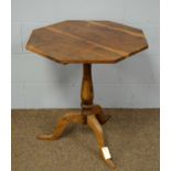 A 20th Century yew wood tripod table.