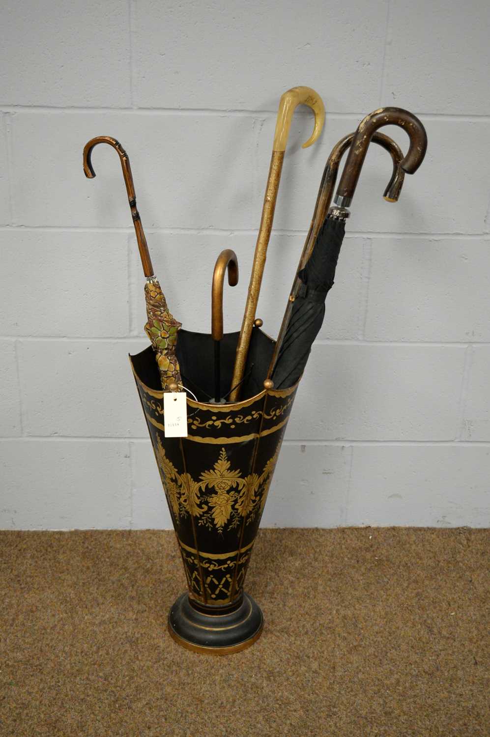 A 20th Century Tolware umbrella stand in the form of an umbrella.