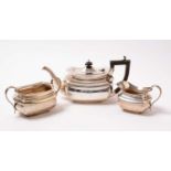 A George V silver three-piece tea service.