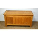 A 20th Century oak blanket box.