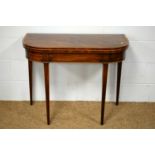 A 19th Century mahogany tea table.