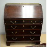 An early 19th Century mahogany bureau.