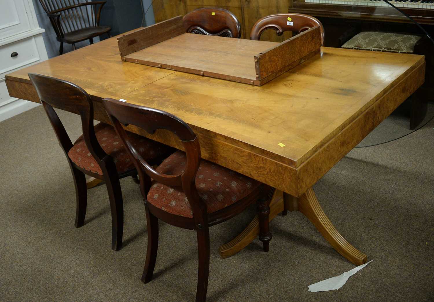 An Art Deco walnut dining room suite.