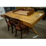 An Art Deco walnut dining room suite.