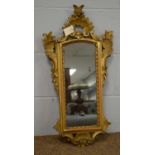 A 19th Century gilt wall mirror.