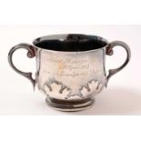 An Edwardian silver porringer.