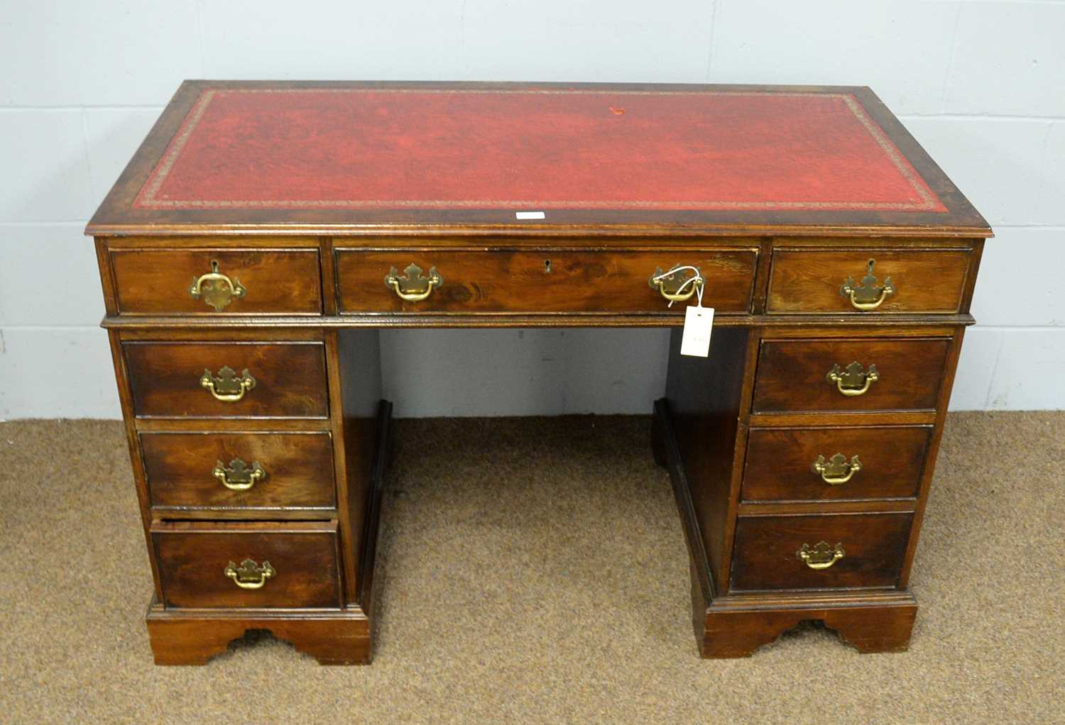 An early 20th Century stained pine writing desk.