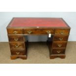 An early 20th Century stained pine writing desk.