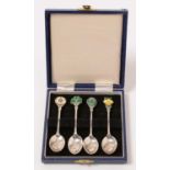 A cased set of four 'National Emblems of the United Kingdom' novelty silver spoons.