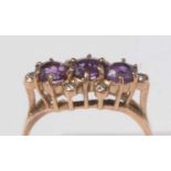 A 9ct gold, amethyst and diamond dress ring.