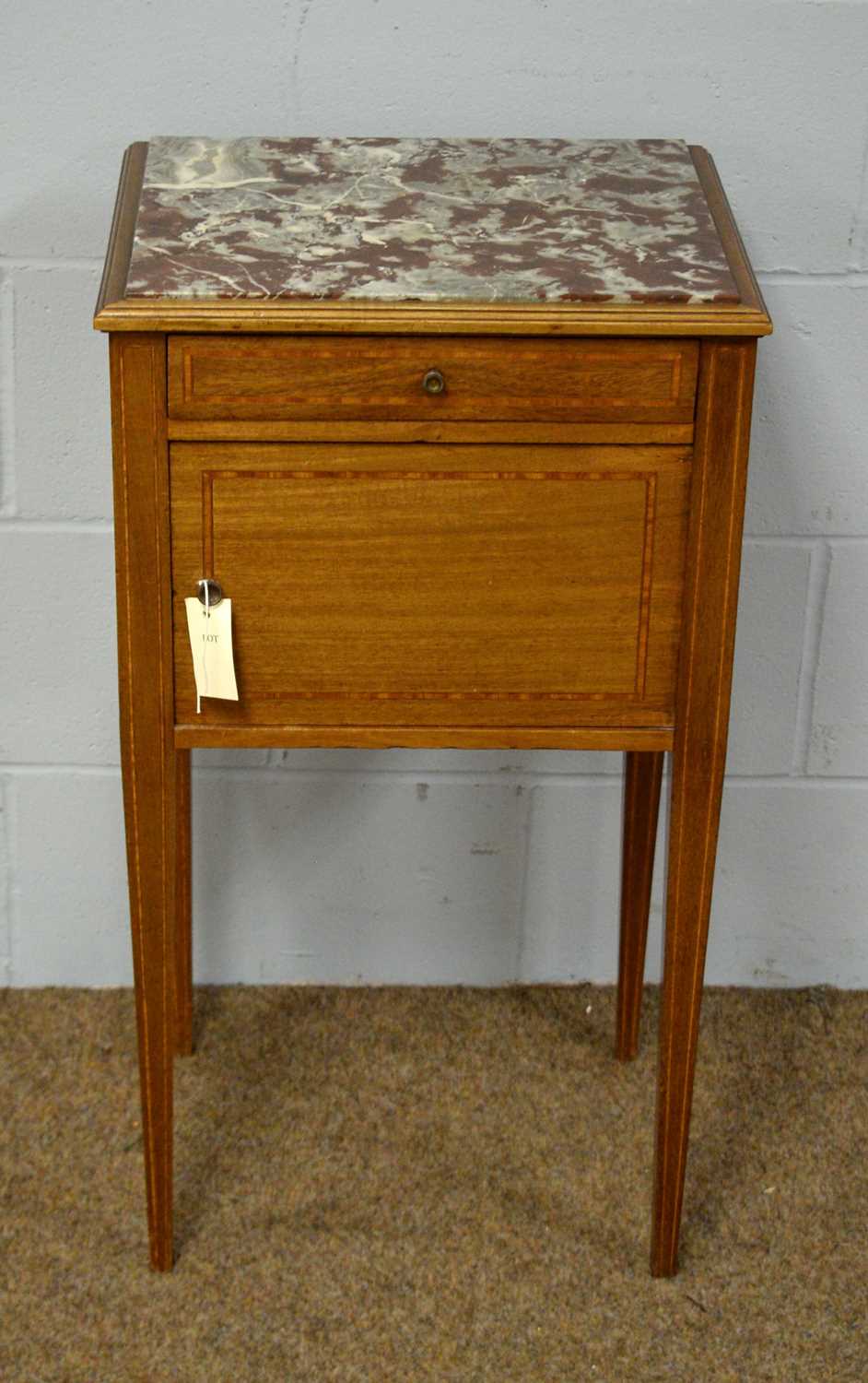 An early 20th C French mahogany and marble top pot cupboard.
