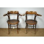 A pair of early 20th Century Bentwood armchairs.