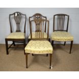 Four dining chairs.