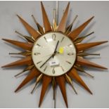 A Metamec starburst wall clock