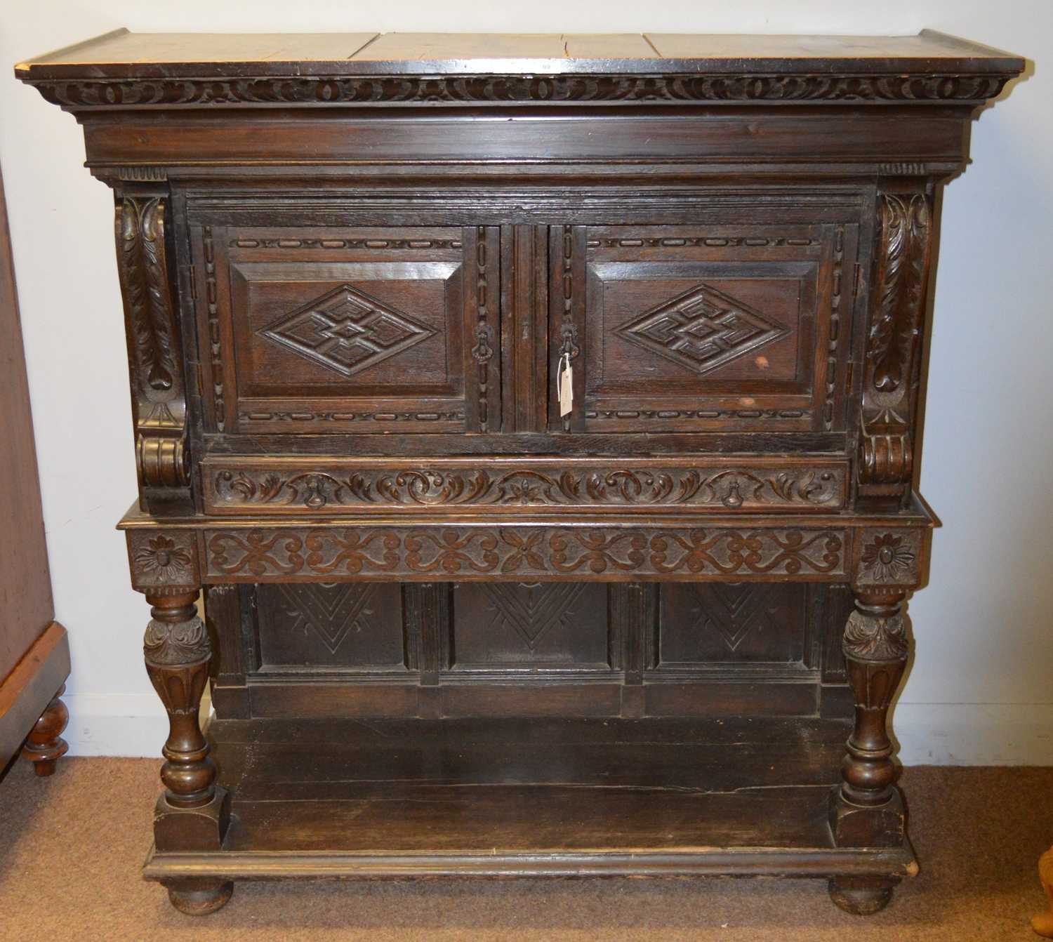 An 18th Century and later oak cupboard