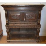 An 18th Century and later oak cupboard
