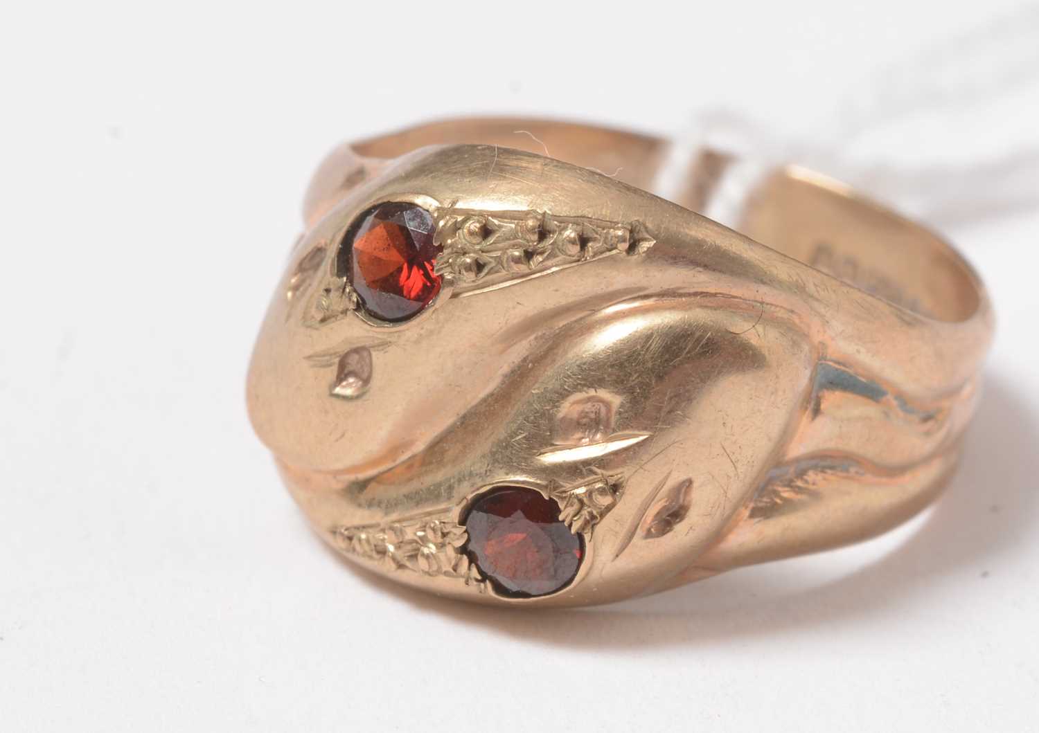 A vintage 9ct gold and garnet serpent ring. - Image 3 of 4