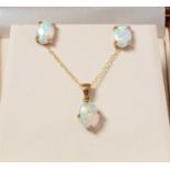 An opal pendant necklace and earring set