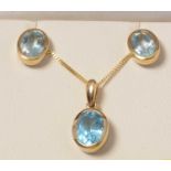 A 9ct gold and Topaz pendant necklace and earring set.