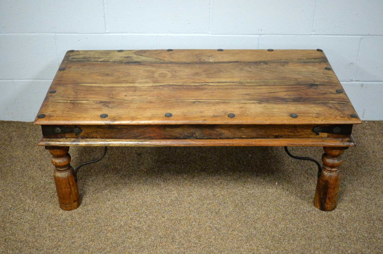 A 20th Century hardwood coffee table.