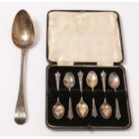 A cased set of six 1930s silver coffee spoons, and a Georgian silver tablespoon.