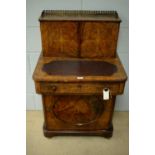 A Victorian walnut bonheur du jour.