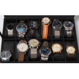 A collection of gentlemen's contemporary fashion watches.