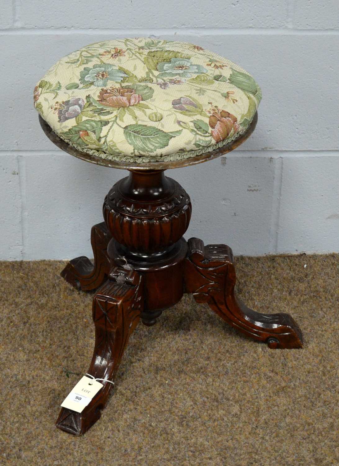 A Victorian piano stool.