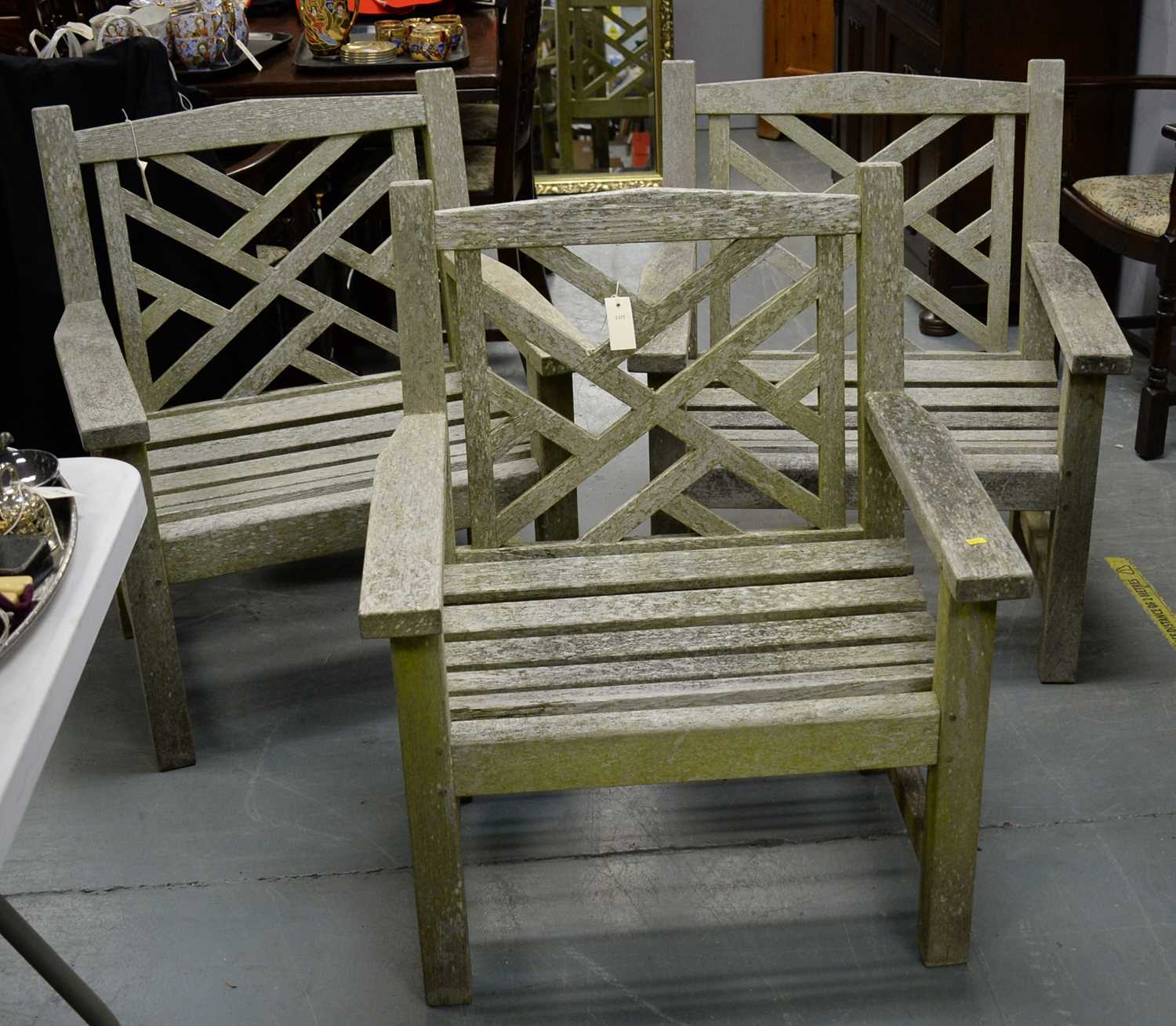 20th C set of three teak garden chairs, and a coffee table, all by Lister.