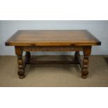 A 20th Century Siesta oak draw leaf dining table.