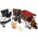 Field glasses, cameras and accessories.