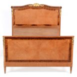 Louis XVI style inlaid mahogany and amboyna double bed.