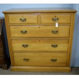 A Victorian beech chest of drawers.