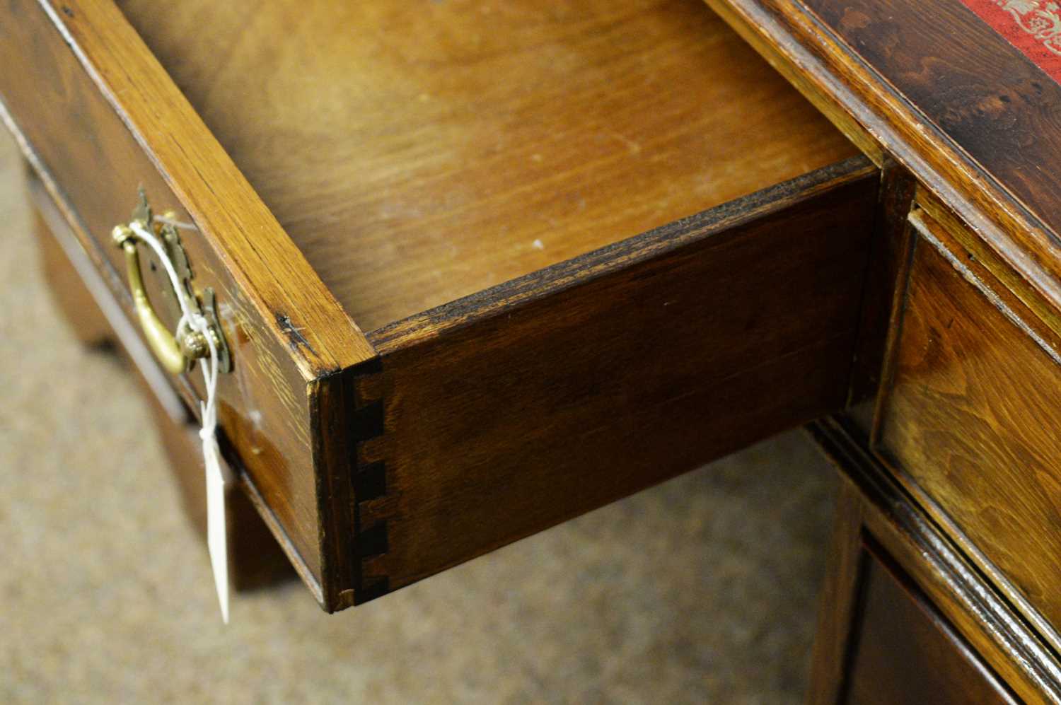 An early 20th Century stained pine writing desk. - Image 2 of 2