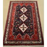 A Senneh carpet.