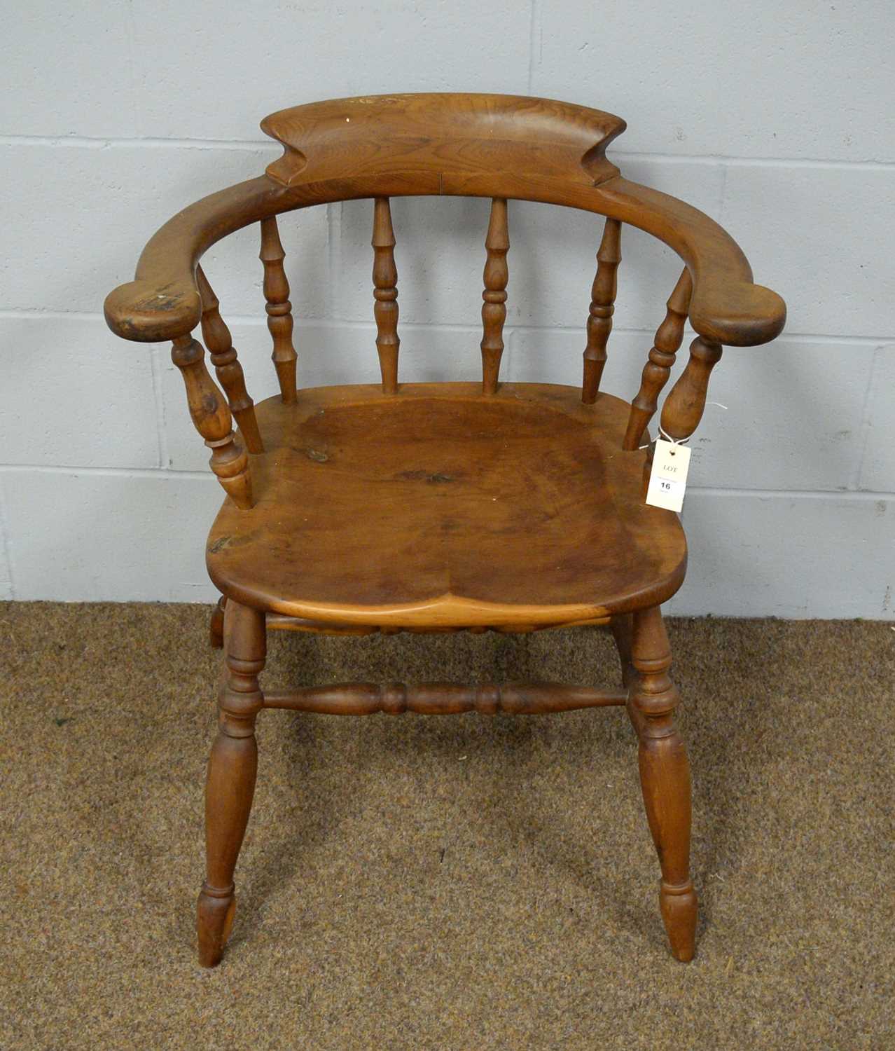 A 20th Century yew wood captain's chair.