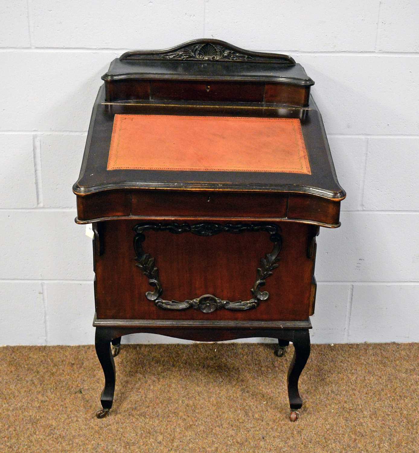 An Edwardian stained mahogany Davenport.