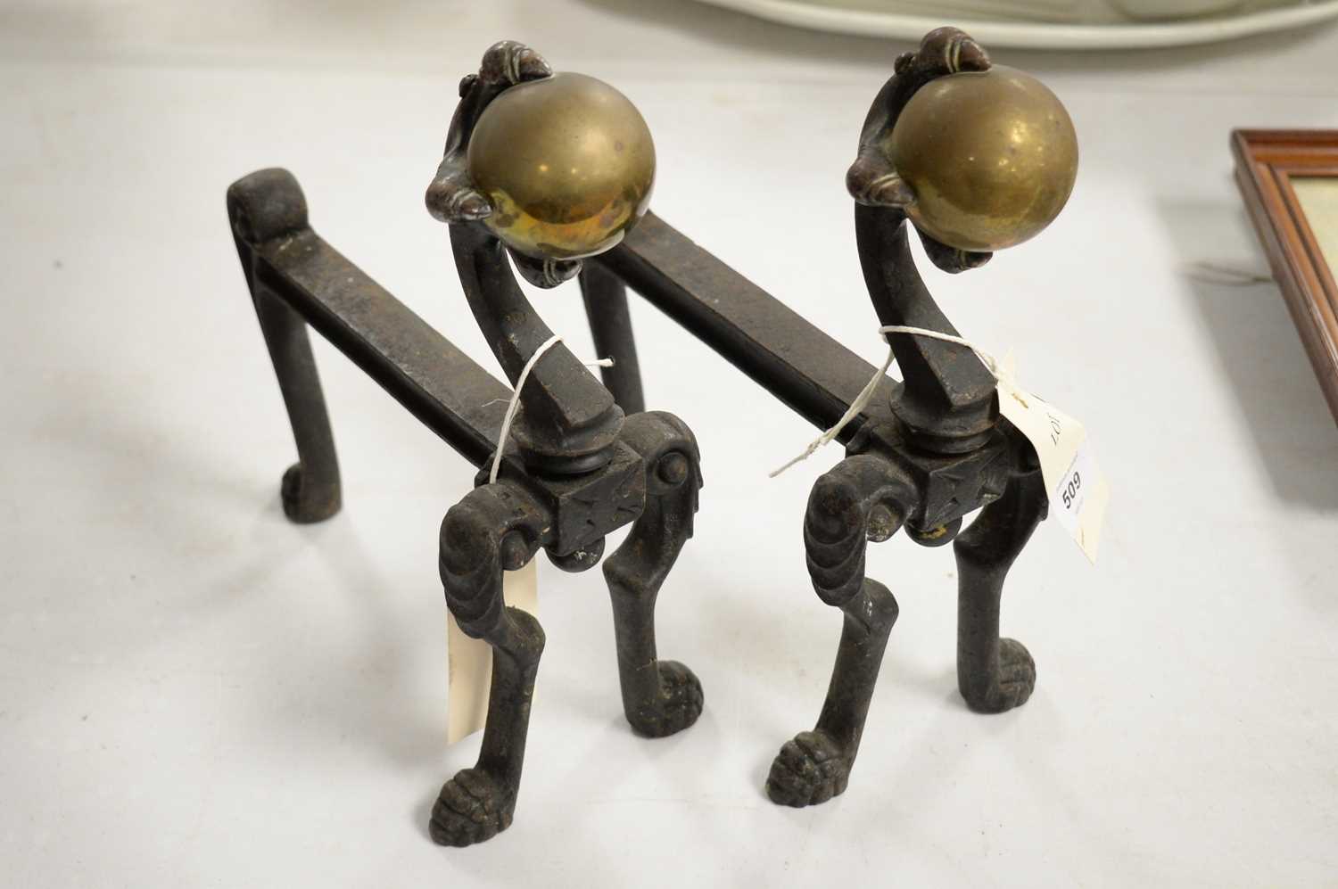 A pair of 19th century cast metal fire andirons
