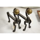 A pair of 19th century cast metal fire andirons