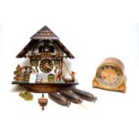 German cuckoo clock; and an Art Decom domed mantel clock.
